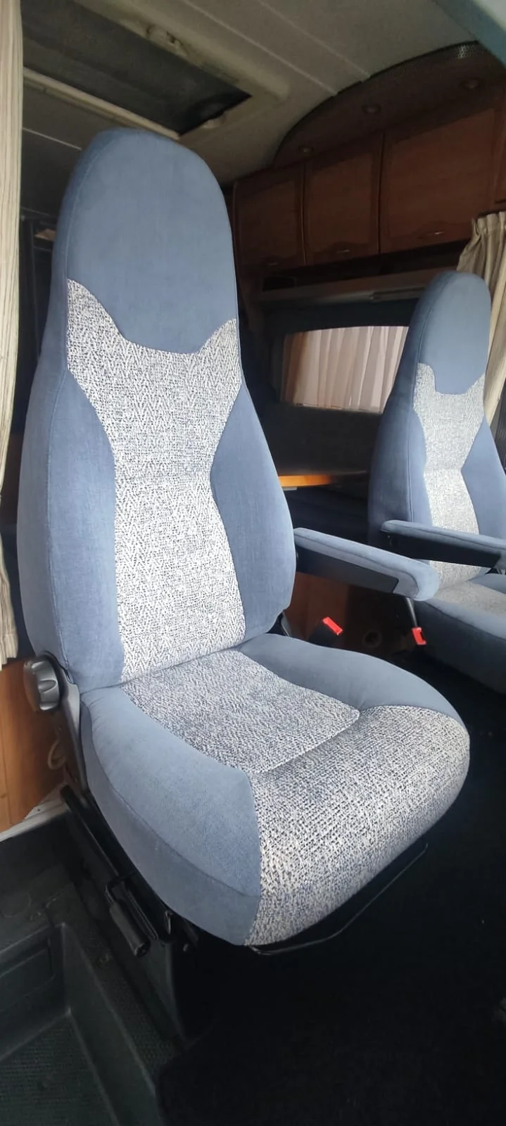 Bekleding van zitplaatsen in een camper